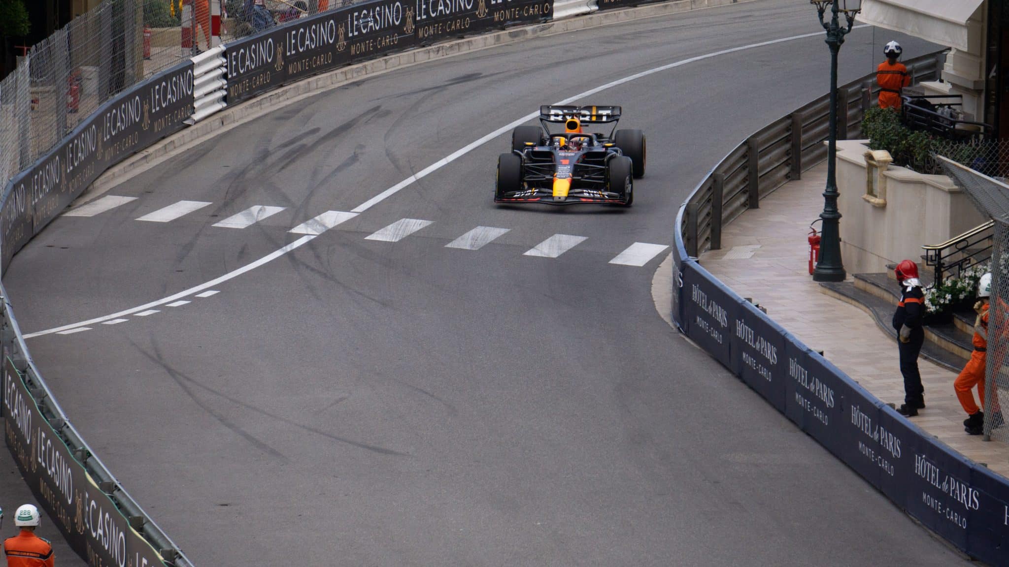 Formula 1 race car speeding on the track in Monaco. - Leadership at 200 MPH: F1's High-Octane Lessons for the C-Suite