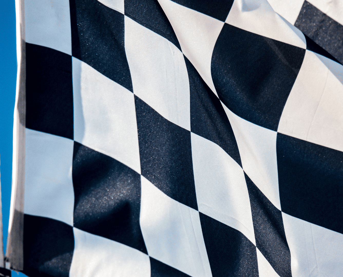 F1 race infused with executive recruitment symbolizing Alder Koten's approach to CPO recruitment