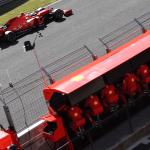 Formula 1 car and business executives symbolizing the blend of F1 strategies in Executive Search in Mexico