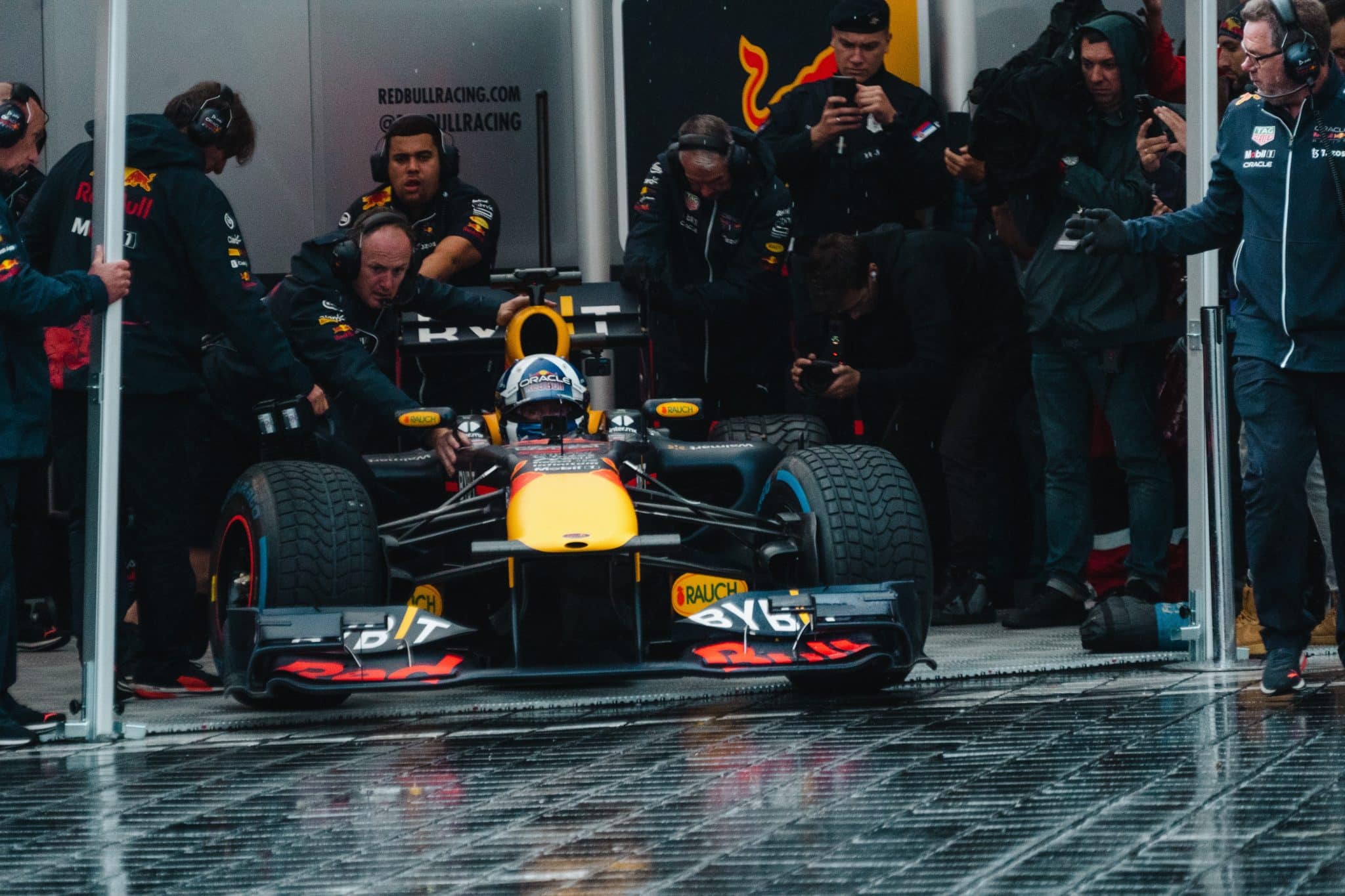 Image of a high-speed F1 car representing the dynamic race for top-tier talent in the tech industry.
