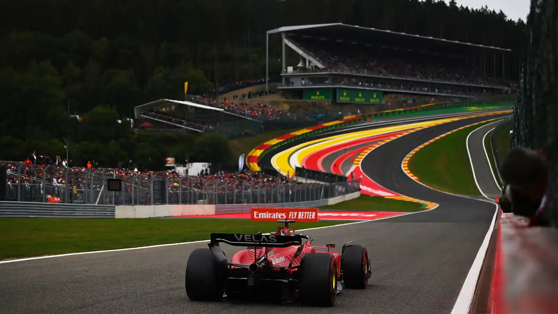 A Formula 1 car racing down the track, symbolizing speed, agility, and focus in startup leadership.
