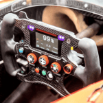 F1 car and headhunter representing the synergy of F1 strategies in executive search in Mexico.