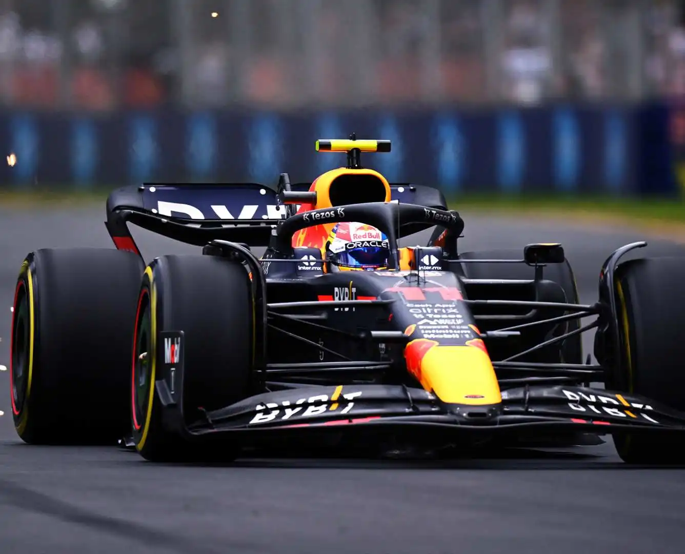 Formula 1 car mastering a sharp turn, mirroring the agility needed in today's dynamic corporate world.
