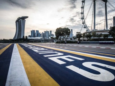 F1 pit stop scene juxtaposed with an executive networking with a recruiter.