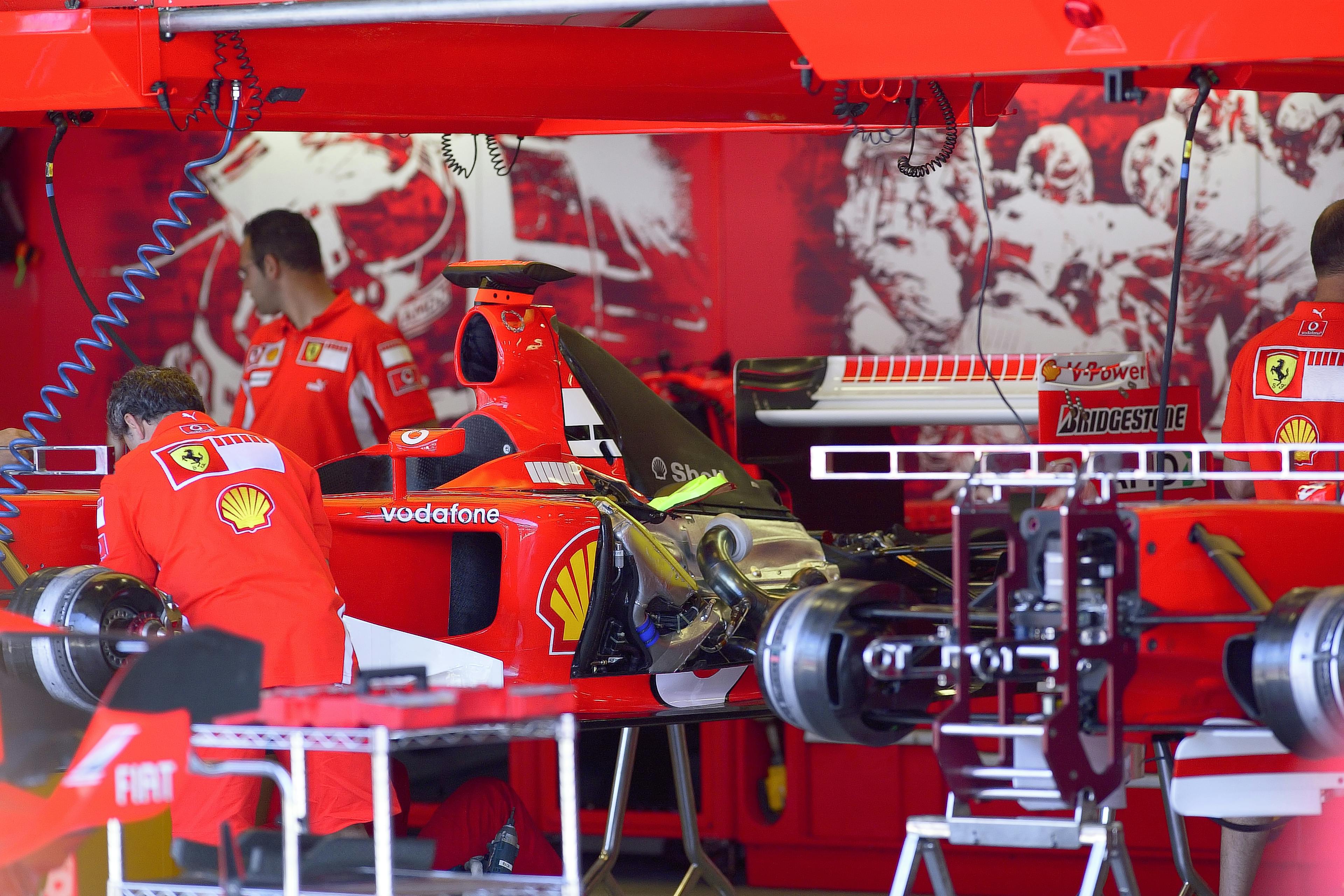 Ferrari team celebrating race victory demonstrating organizational stewardship and institutional legacy that transcends individual leaders