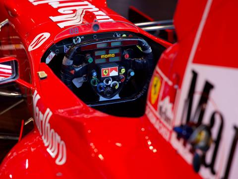 F1 driver cockpit view showing calibration instruments and telemetry representing The Driver Calibration framework for executive assessment