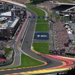 F1 race car positioning at track limits during corner, demonstrating clear boundaries enabling maximum performance