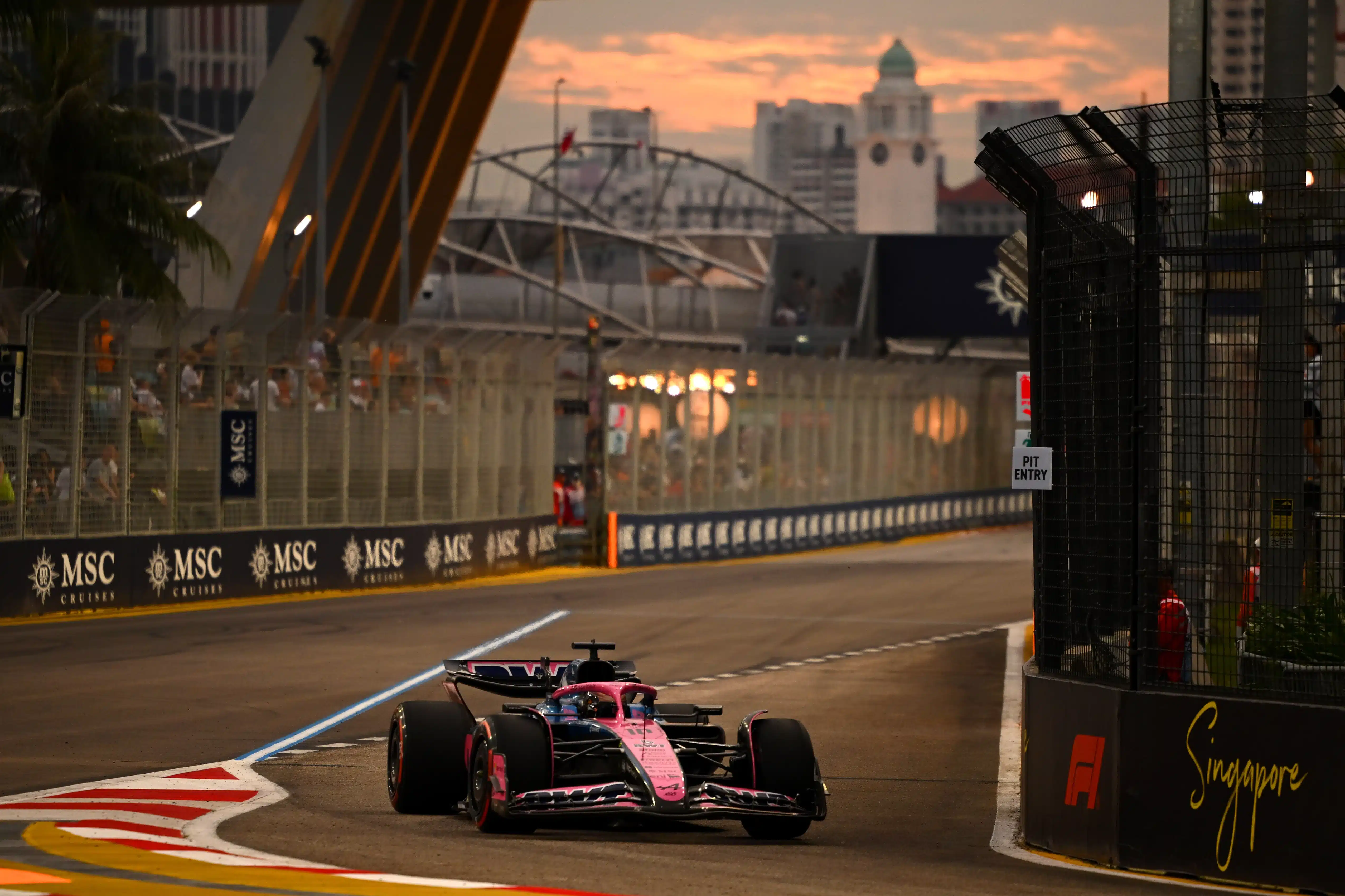 F1 pit stop transition moment representing the shift from founder mode to operator mode at Series B