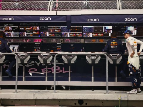 Empty pit wall station with blank label illustrating the undefined COO role in the C-suite