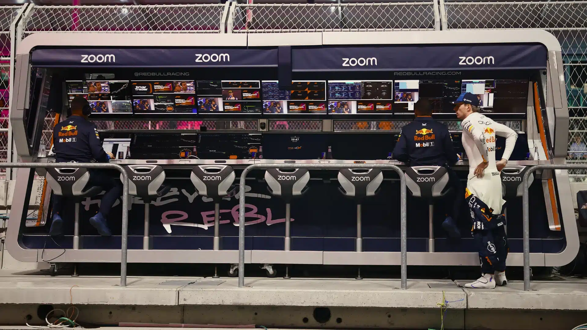 Empty pit wall station with blank label illustrating the undefined COO role in the C-suite