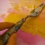 Founder painting over a CMO's finished brand strategy illustrating founder brand attachment conflict