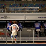 Disconnected F1 pit wall monitors illustrating fragmented revenue leadership without unified authority