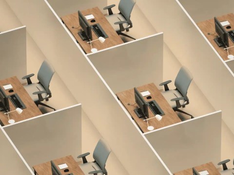 Empty analyst workstation with a spreadsheet on screen, representing AI and talent development gaps
