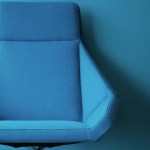 One office chair empty at a desk, representing CEO succession planning in progress