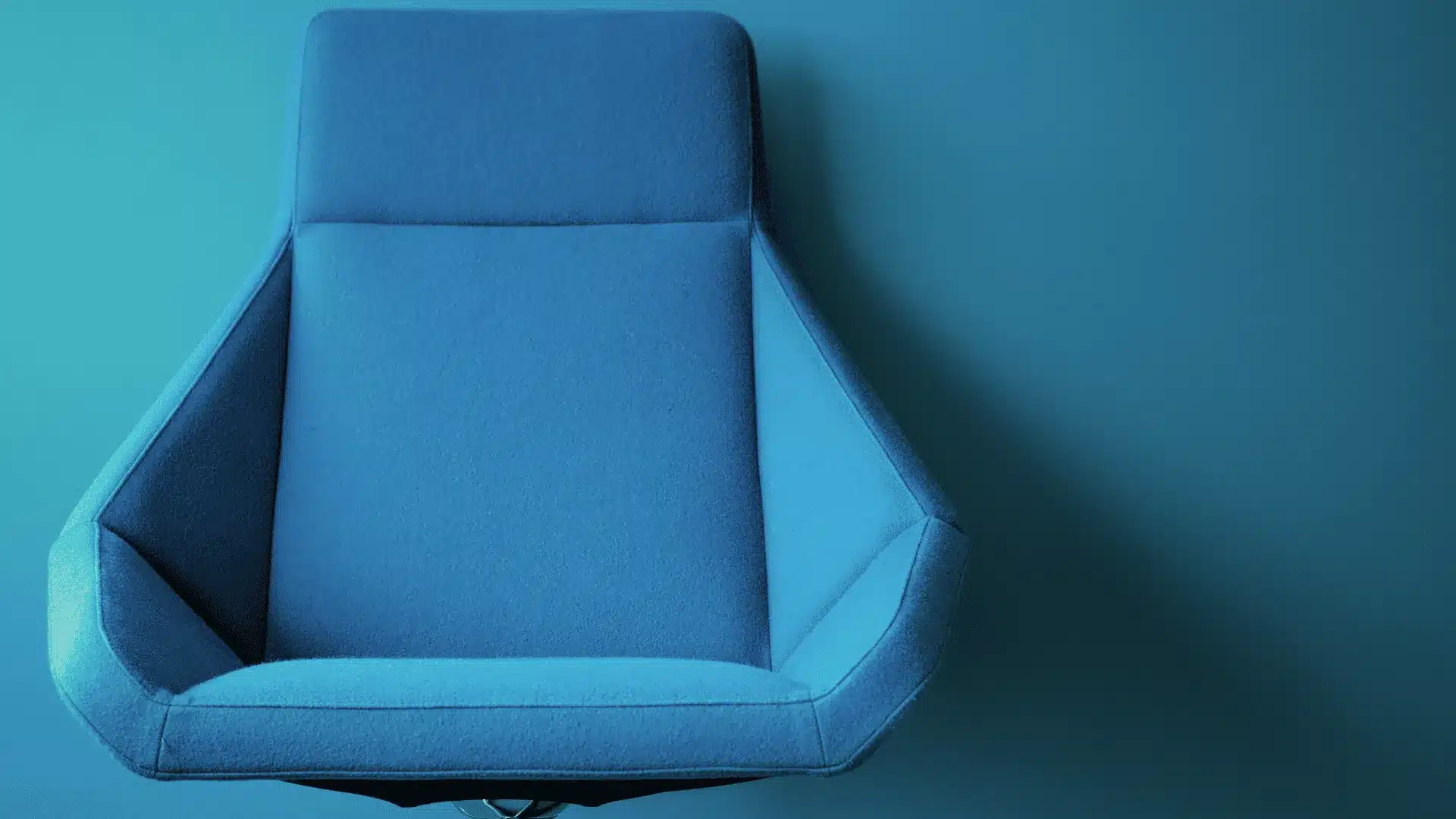 One office chair empty at a desk, representing CEO succession planning in progress