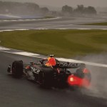 Racetrack surface at the boundary between dry and wet conditions, symbolizing the nearshoring VP of operations role